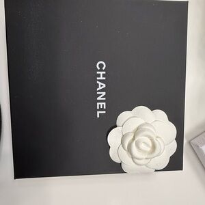 CHANEL Black Box with White Floral Accent